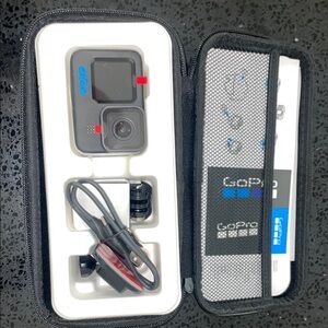 GoPro Black and Red Digital Camera with Accessories